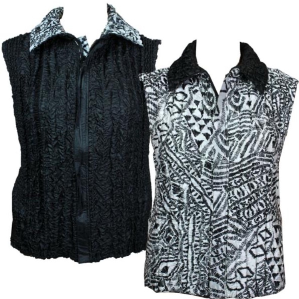 NWOT size large/XL reversible vest, one side black, the other side, black&white